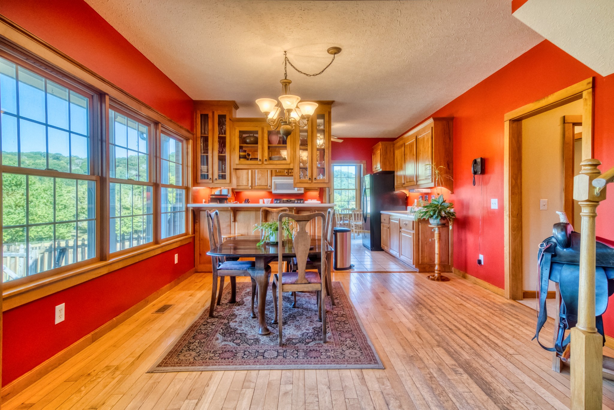 216 Old Wolf Hill Road Bethpage, TN 37022 - Photo 14 of 48 a dining room with furniture a chandelier and wooden floor