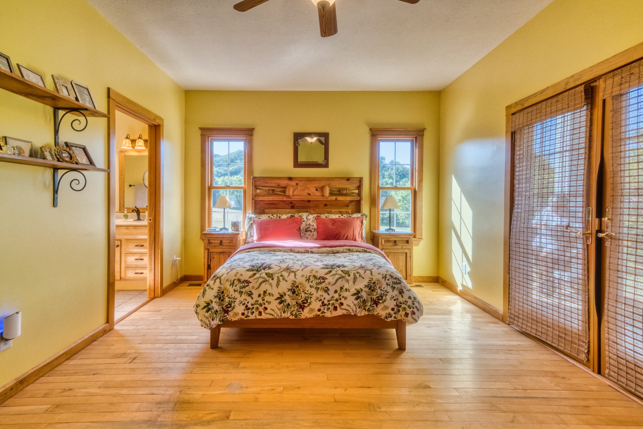 216 Old Wolf Hill Road Bethpage, TN 37022 - Photo 15 of 48 a bedroom with a bed and wooden floor