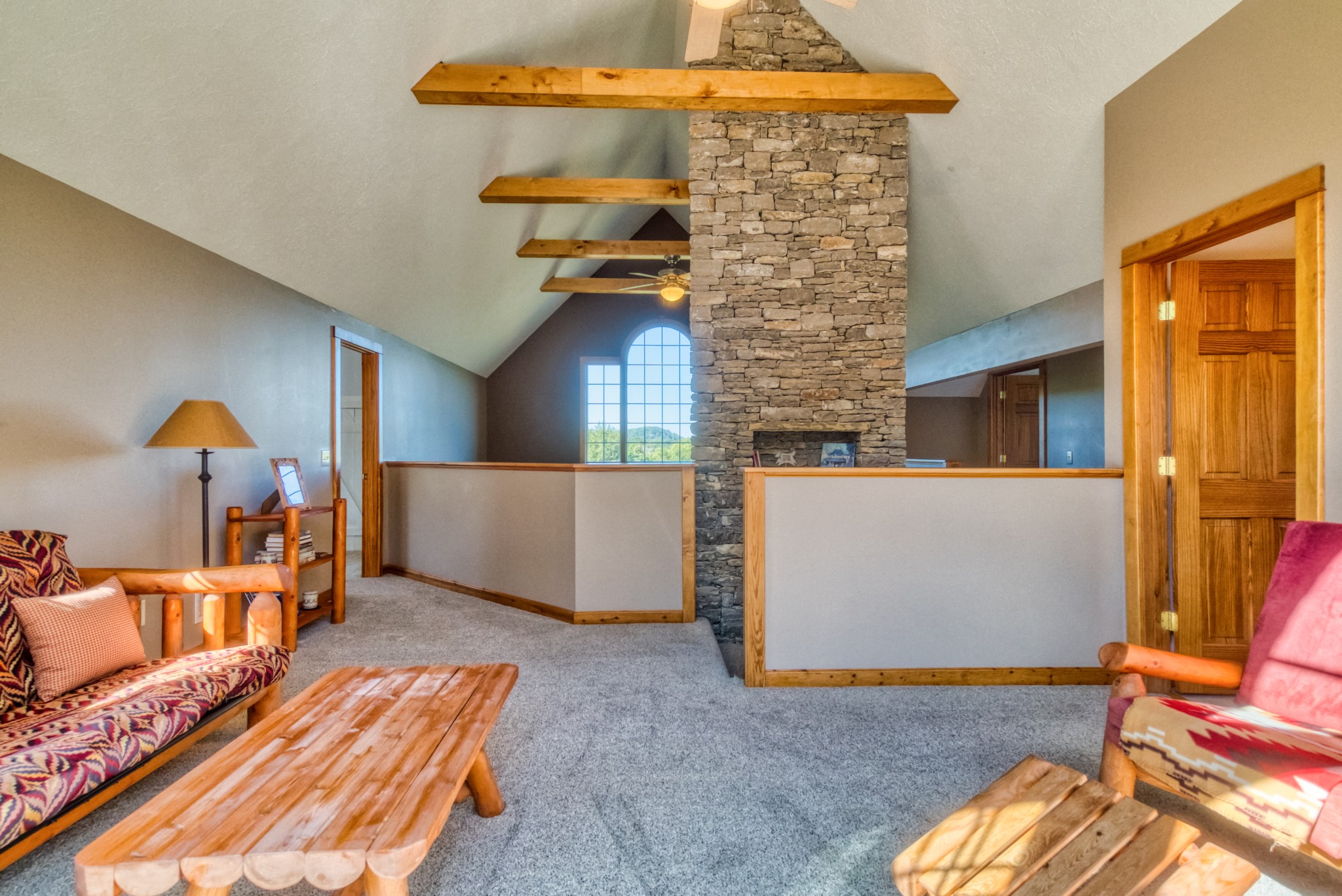 216 Old Wolf Hill Road Bethpage, TN 37022 - Photo 26 of 48 a bed room with a bed and a couch