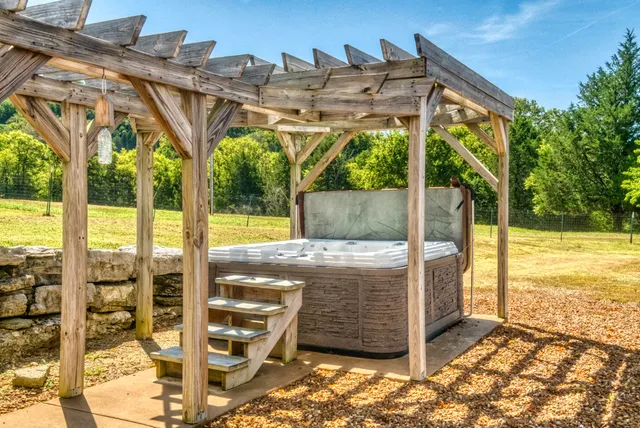 a view of a couches in the patio and a yard