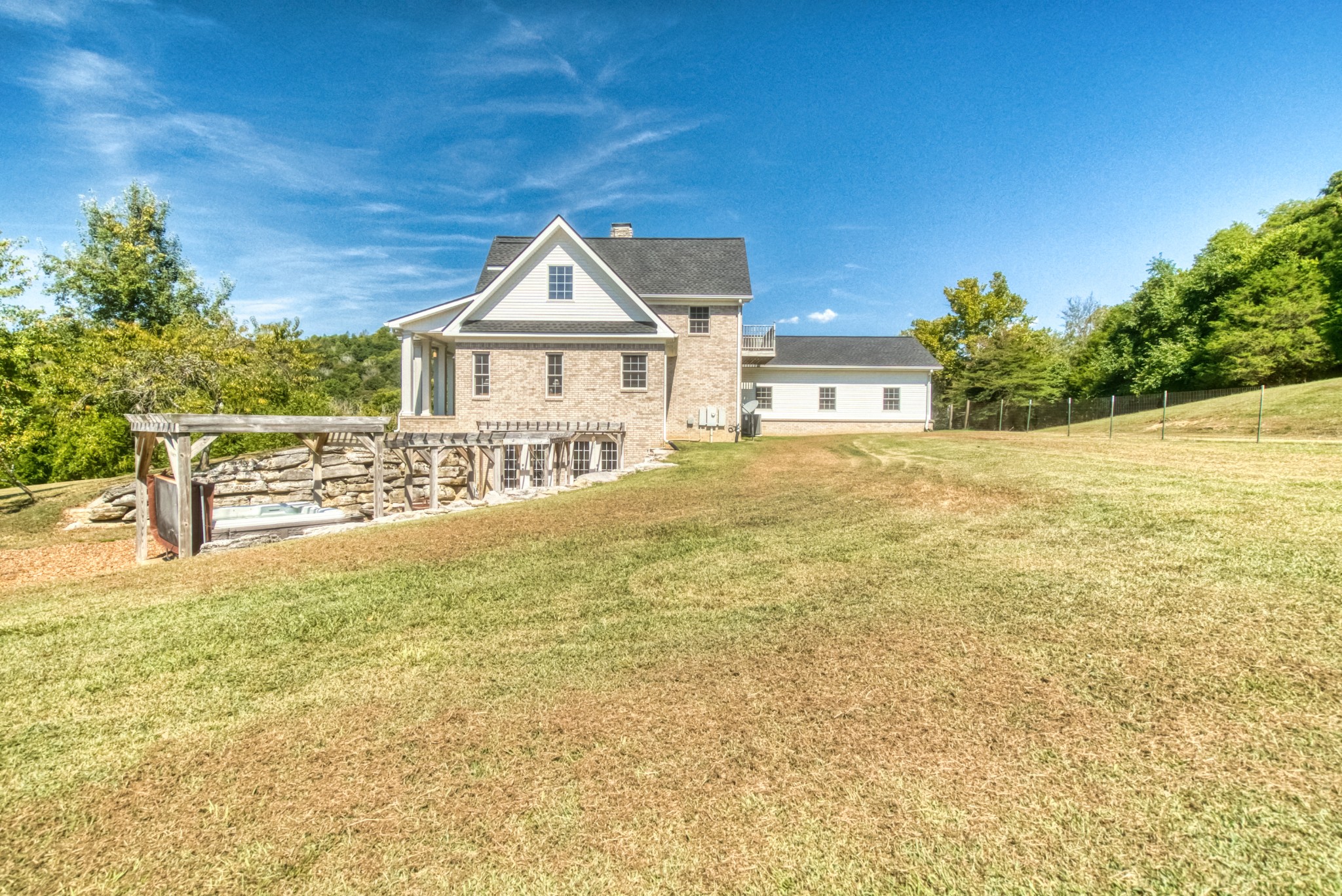 216 Old Wolf Hill Road Bethpage, TN 37022 - Photo 39 of 48 a house with trees in the background
