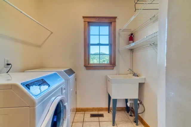 a utility room with dryer and washer