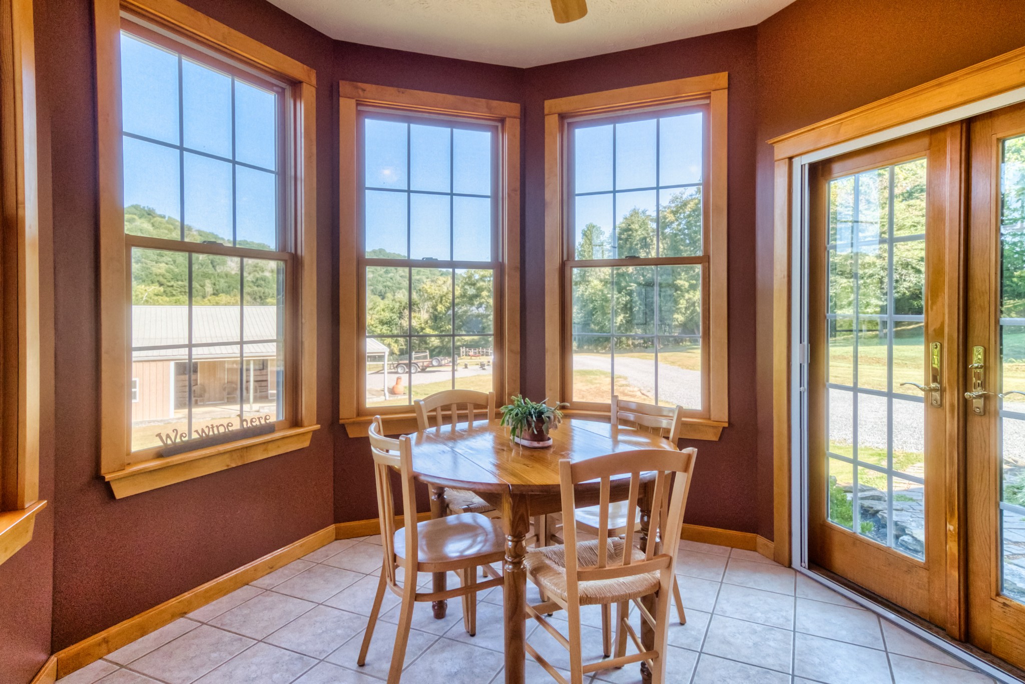 216 Old Wolf Hill Road Bethpage, TN 37022 - Photo 7 of 48 a dining room with furniture window outside view and wooden floor