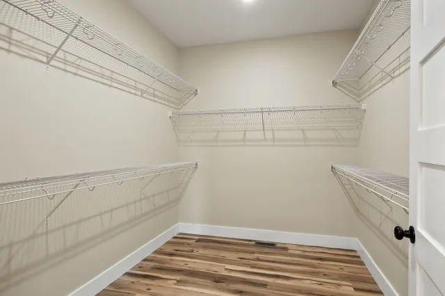 a view of a room with racks on the wall