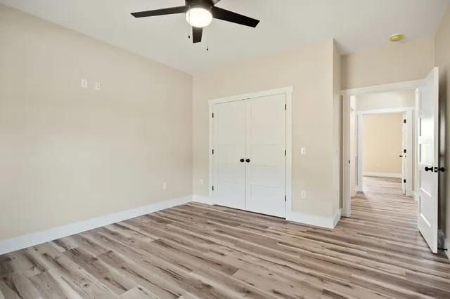 a view of a livingroom with wooden floor