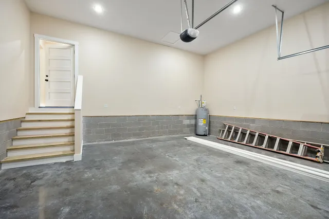 a view of an empty room with stairs