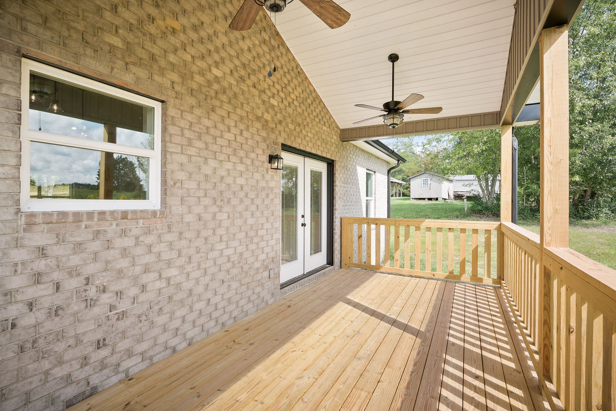 6544 Thomas Twin Oaks Road Baxter, TN 38544 - Photo 31 of 32 a view of a balcony with wooden floor