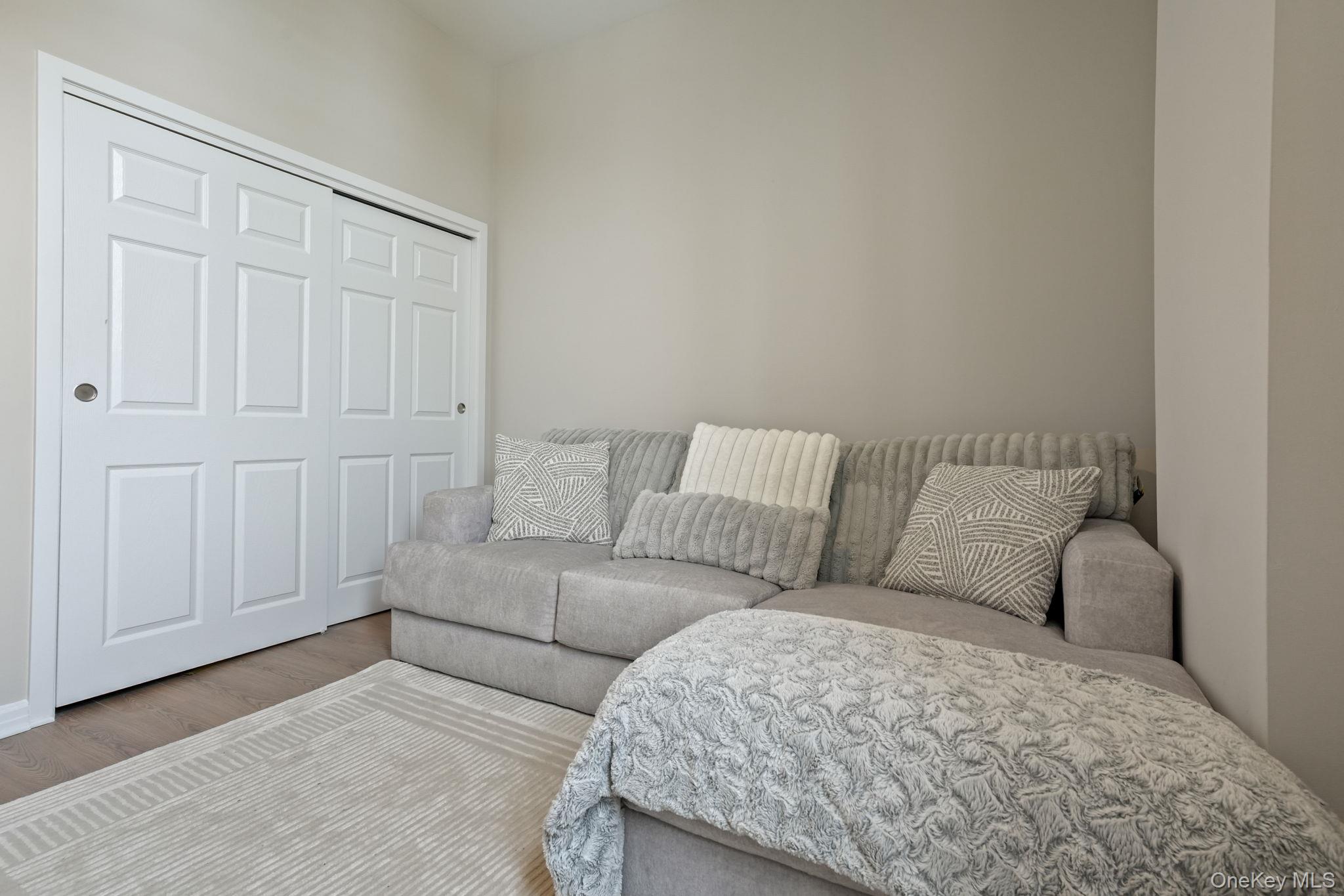 5108 Villa At The Peekskill, NY 10566 - Photo 12 of 26 a living room with a couch and cabinets