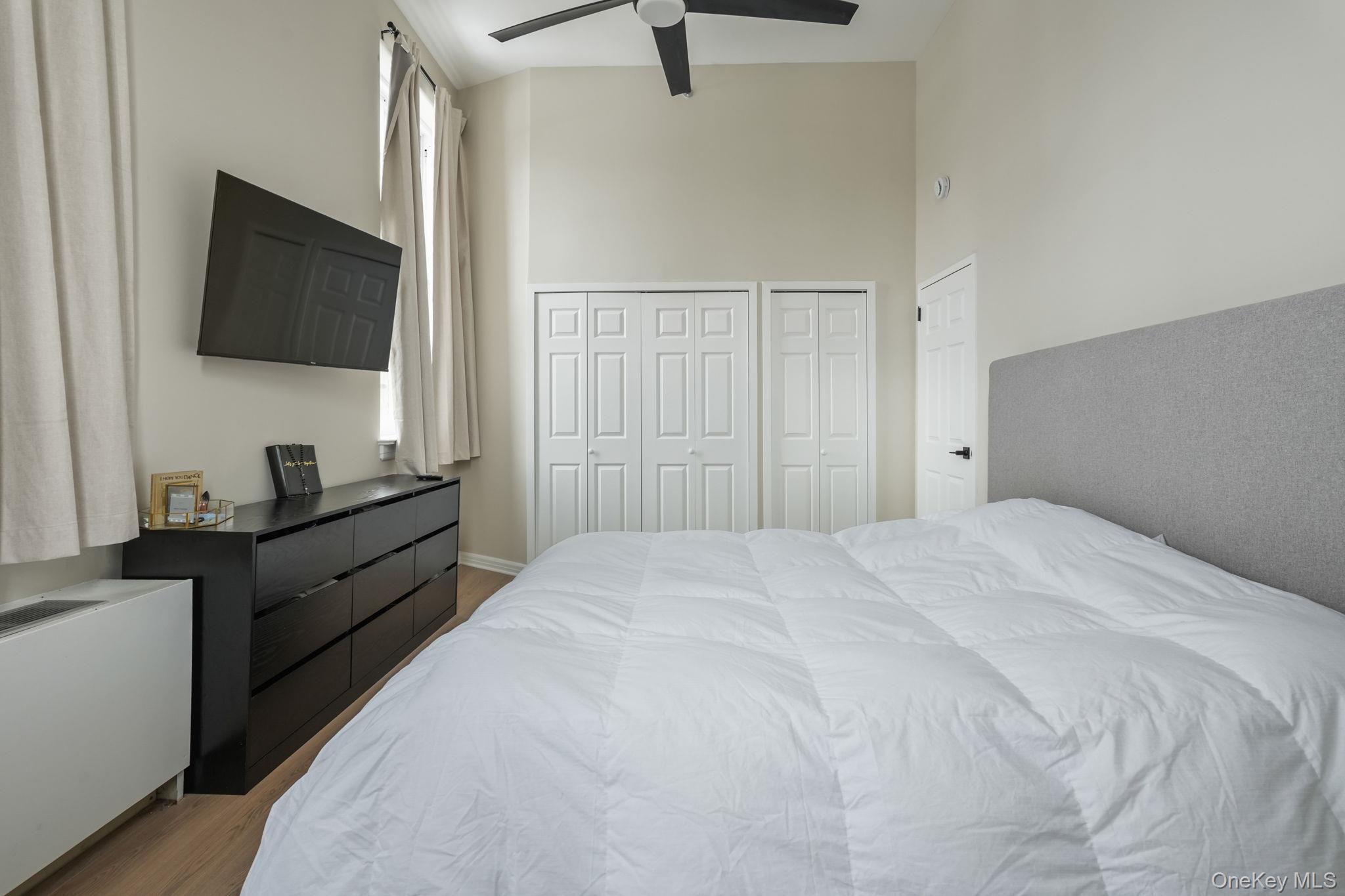 5108 Villa At The Peekskill, NY 10566 - Photo 16 of 26 a large bedroom with a bed and a flat screen tv