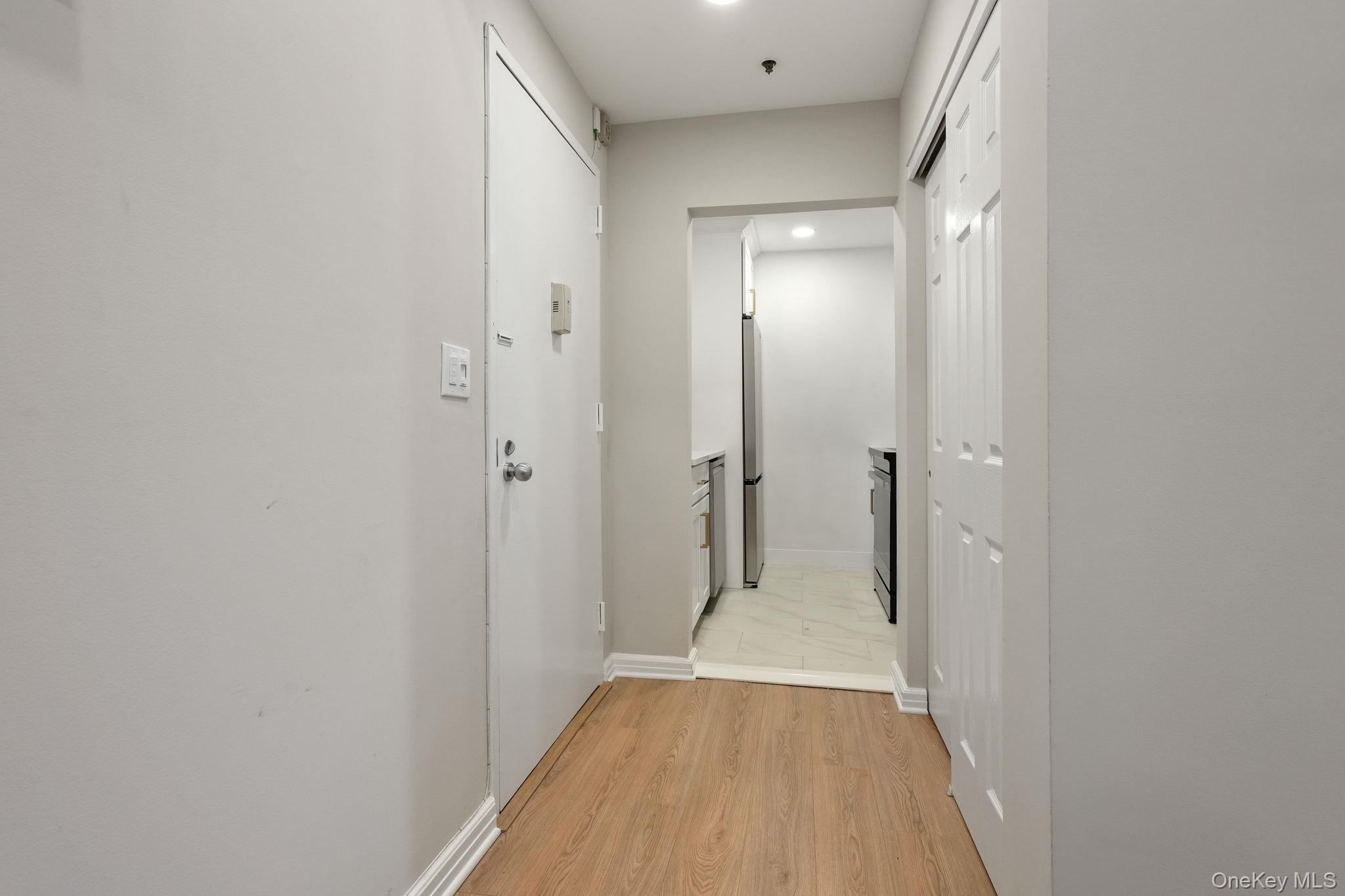 5108 Villa At The Peekskill, NY 10566 - Photo 19 of 26 a view of a hallway with wooden floor