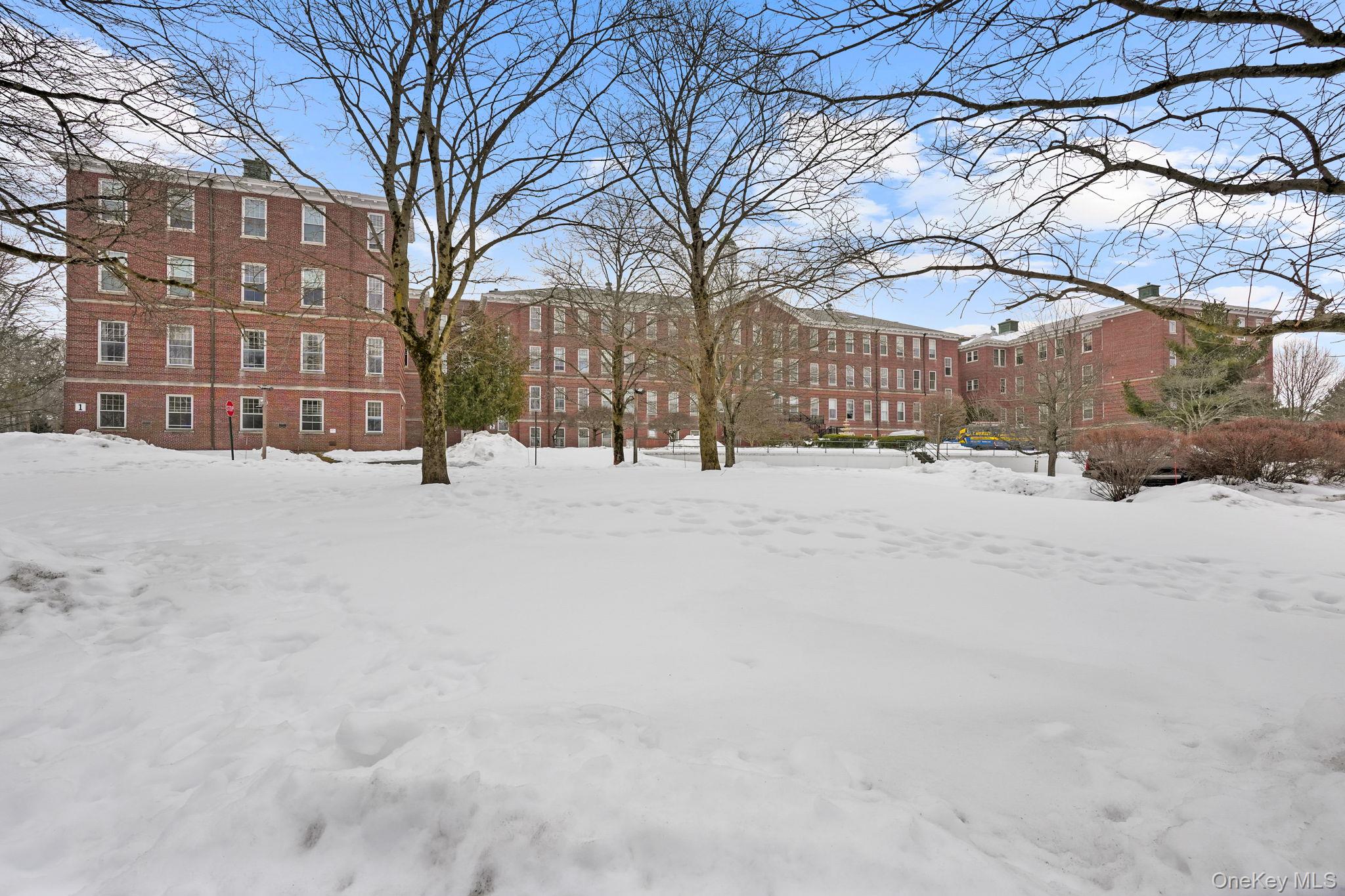 5108 Villa At The Peekskill, NY 10566 - Photo 23 of 26 a street view with large trees
