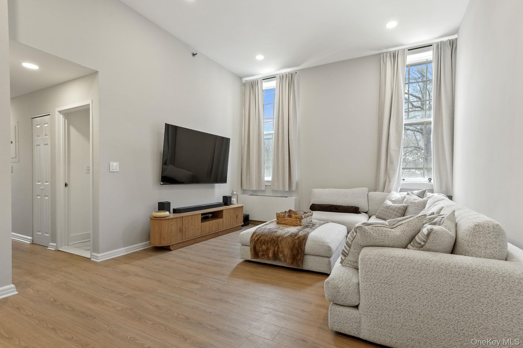 5108 Villa At The Peekskill, NY 10566 - Photo 3 of 26 a living room with furniture and a flat screen tv