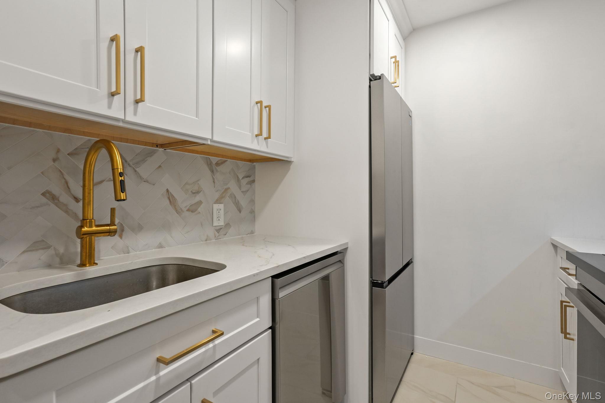 5108 Villa At The Peekskill, NY 10566 - Photo 4 of 26 a close view of a sink and cabinets