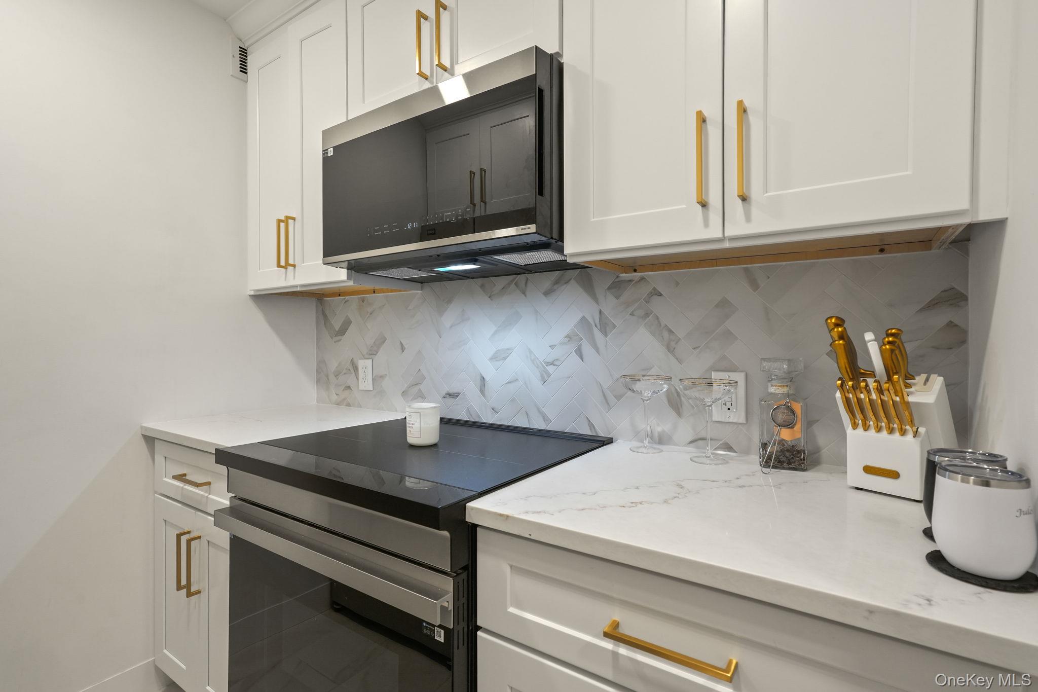 5108 Villa At The Peekskill, NY 10566 - Photo 5 of 26 a kitchen with a sink and cabinets