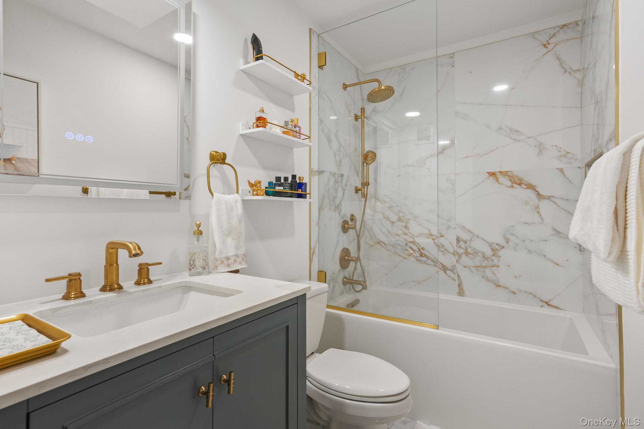 5108 Villa At The Peekskill, NY 10566 - Photo 8 of 26 a bathroom with a granite countertop sink toilet and shower