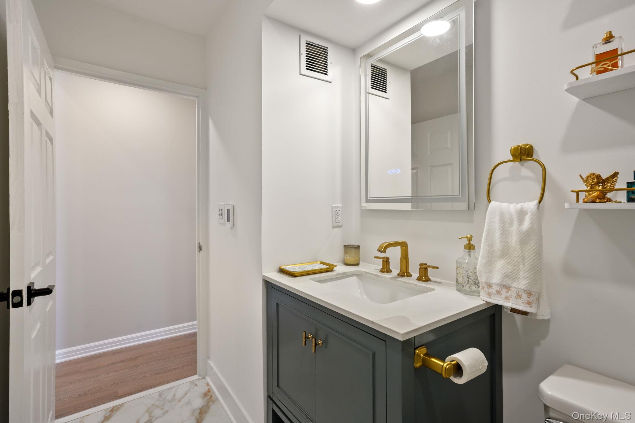 5108 Villa At The Peekskill, NY 10566 - Photo 9 of 26 a bathroom with a sink toilet and vanity