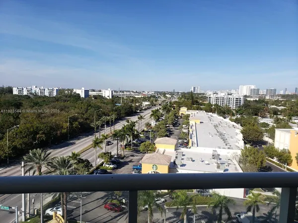 a view of swimming pool from a balcony
