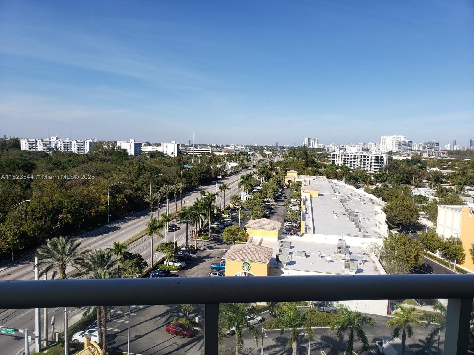 13499 Biscayne Boulevard, Unit 1005 North Miami, FL 33181 - Photo 1 of 15 a view of swimming pool from a balcony