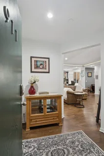a living room with furniture and a couch
