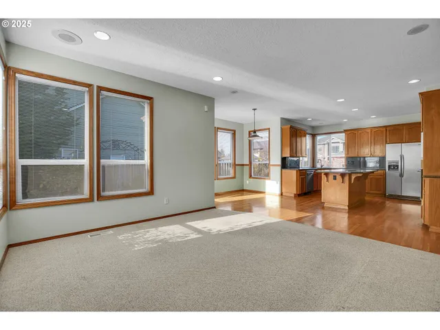 a utility room with sink dryer and washer