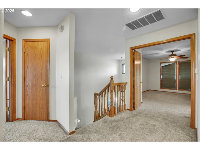 a bathroom with a sink double vanity and a mirror