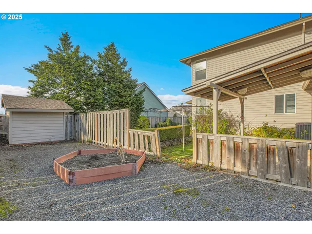 a view of a chair and table in the patio