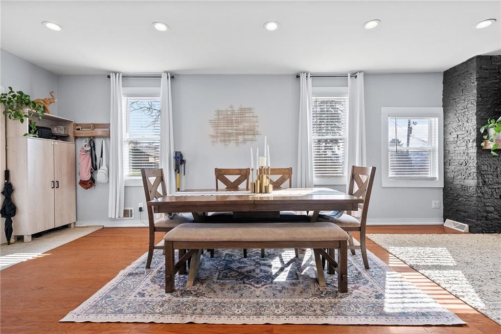 449 Elwyn Avenue Springdale, PA 15144 - Photo 13 of 46 a living room with furniture and a rug