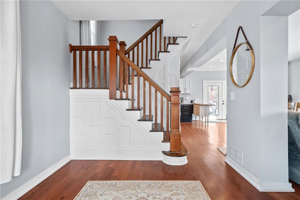 449 Elwyn Avenue Springdale, PA 15144 - Photo 7 of 46 a view of entryway and hall with wooden floor