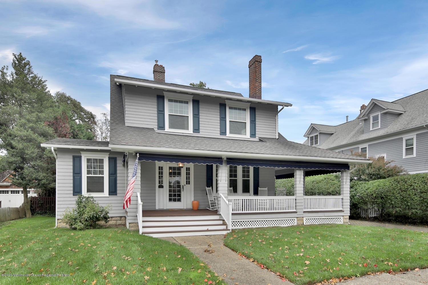 front view of a house with a yard