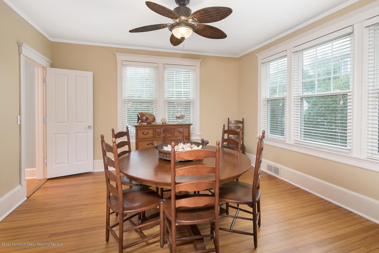 408 Tuttle Avenue Spring Lake, NJ 07762 - Photo 13 of 36 a view of a dining room with furniture window and wooden floor