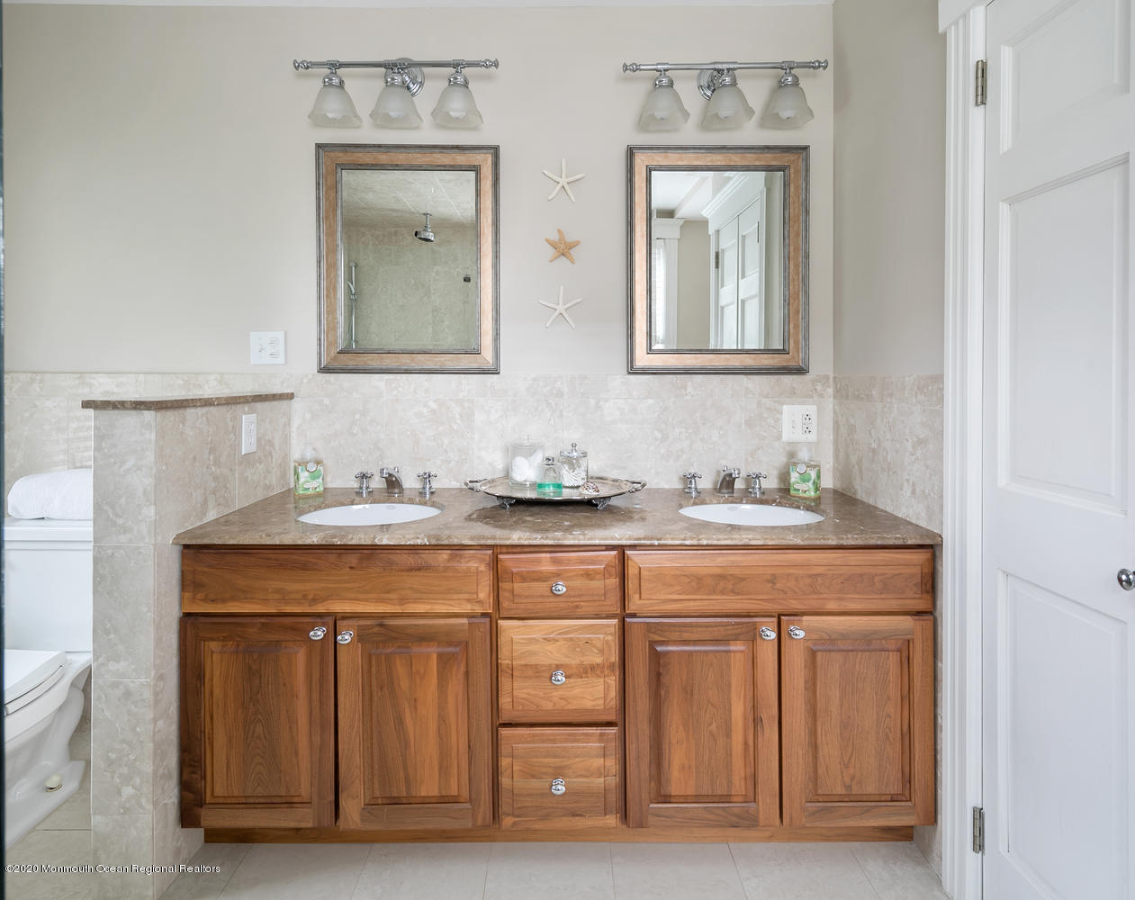 408 Tuttle Avenue Spring Lake, NJ 07762 - Photo 23 of 36 a bathroom with a granite countertop double vanity sink and mirror