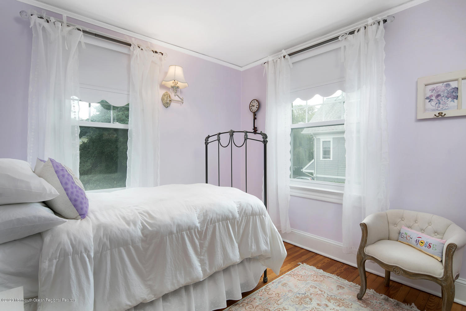 408 Tuttle Avenue Spring Lake, NJ 07762 - Photo 24 of 36 a bedroom with a bed couch and a window