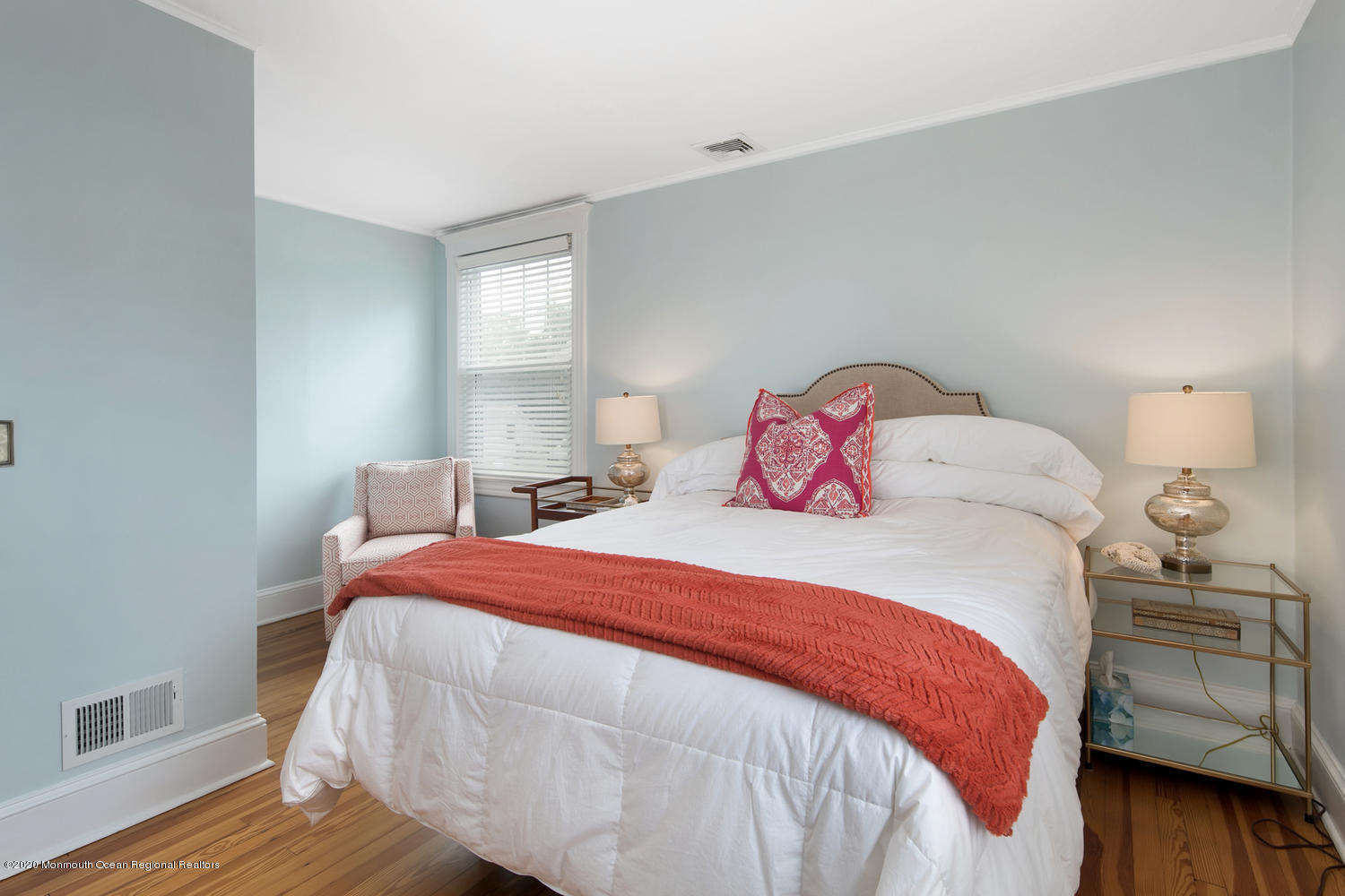 408 Tuttle Avenue Spring Lake, NJ 07762 - Photo 27 of 36 a bedroom with a bed and wooden floor