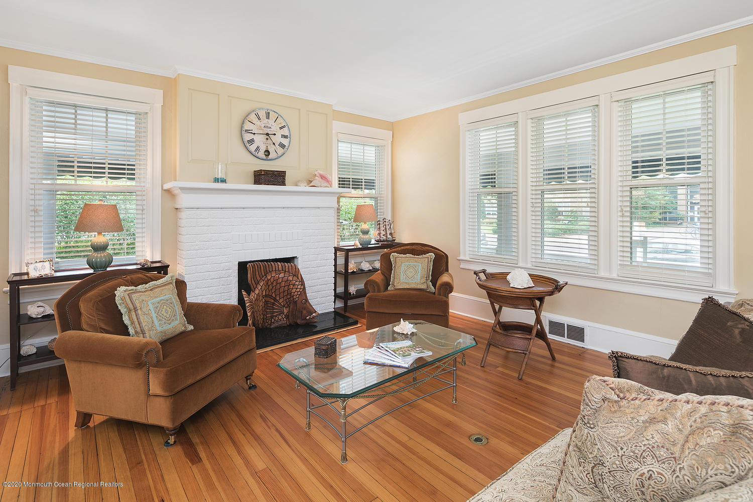 408 Tuttle Avenue Spring Lake, NJ 07762 - Photo 5 of 36 a living room with furniture and a fireplace