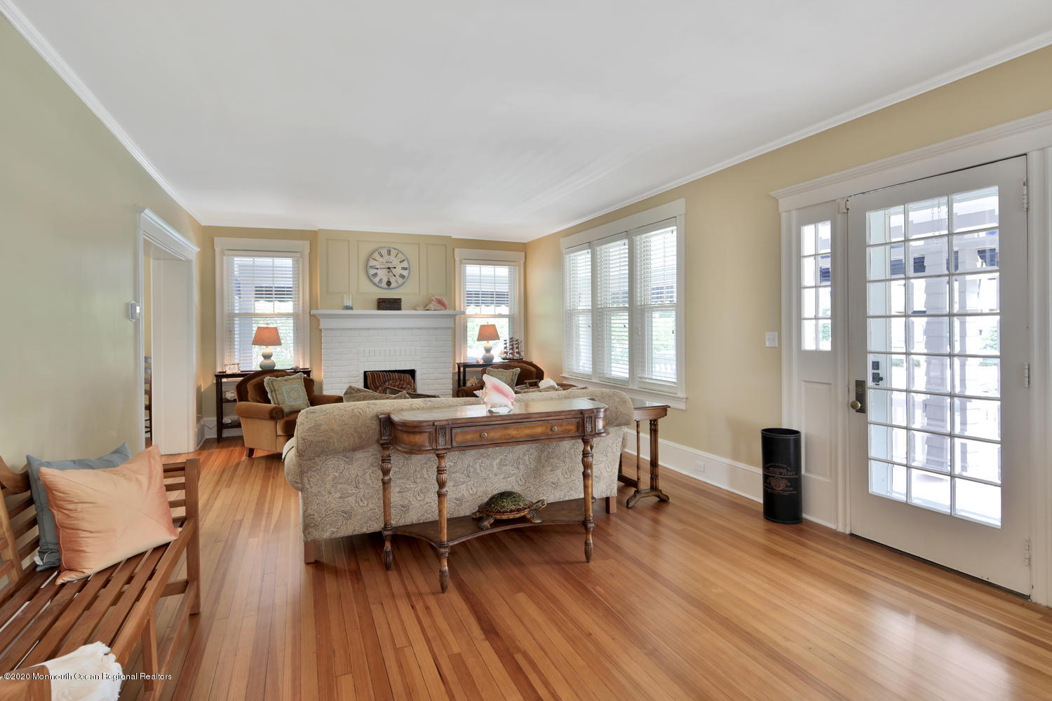 408 Tuttle Avenue Spring Lake, NJ 07762 - Photo 9 of 36 a living room with furniture a wooden floor and a table