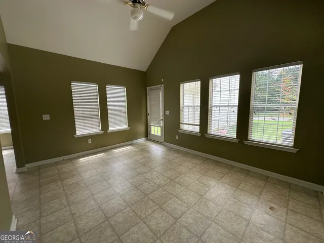 an empty room with windows