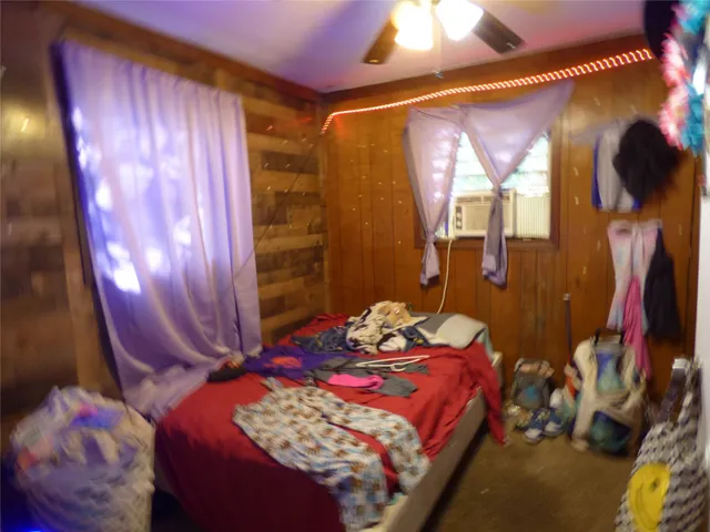 a kitchen with stainless steel appliances kitchen island granite countertop a sink and cabinets