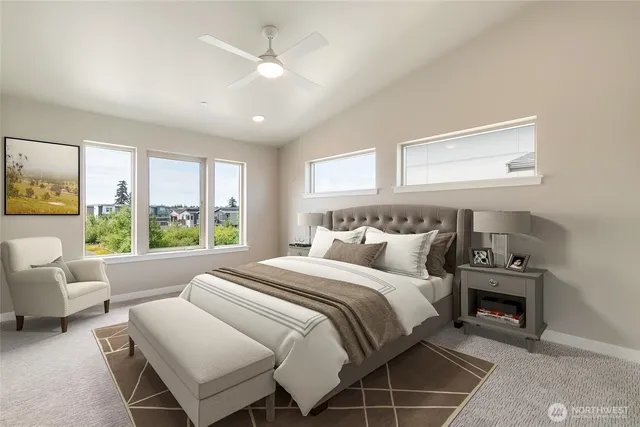 a bedroom with a bed and a couch