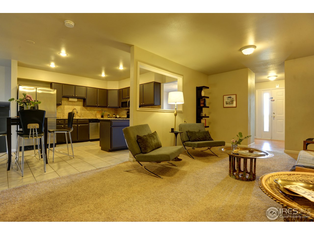 505 West Drake Road Fort Collins, CO 80526 - Photo 12 of 27 Living Room open to Kitchen