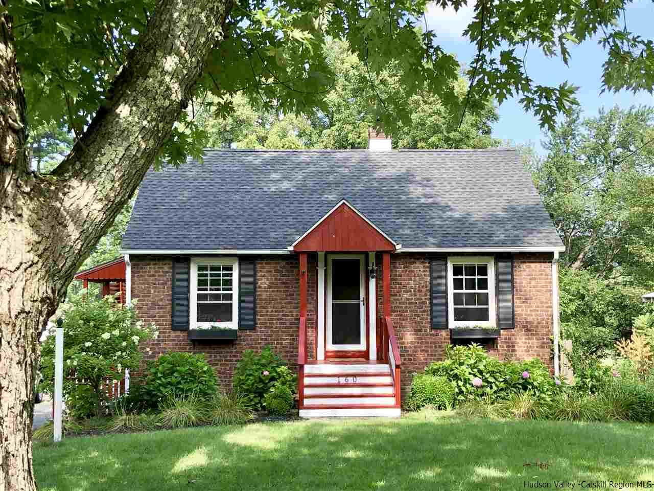 160 Old Rte 209 Hurley, NY 12443 - Photo 1 of 29 a front view of a house with a garden