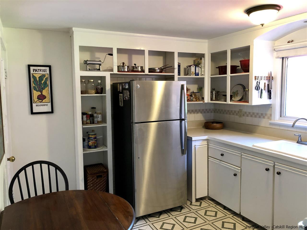 160 Old Rte 209 Hurley, NY 12443 - Photo 13 of 29 a kitchen with stainless steel appliances kitchen island a refrigerator and a sink