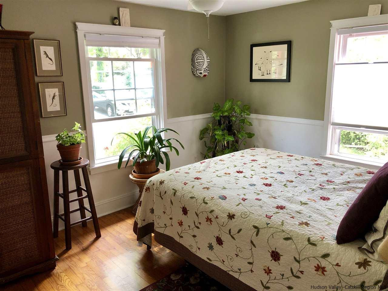 160 Old Rte 209 Hurley, NY 12443 - Photo 17 of 29 a bedroom that has a bed and a chair in it