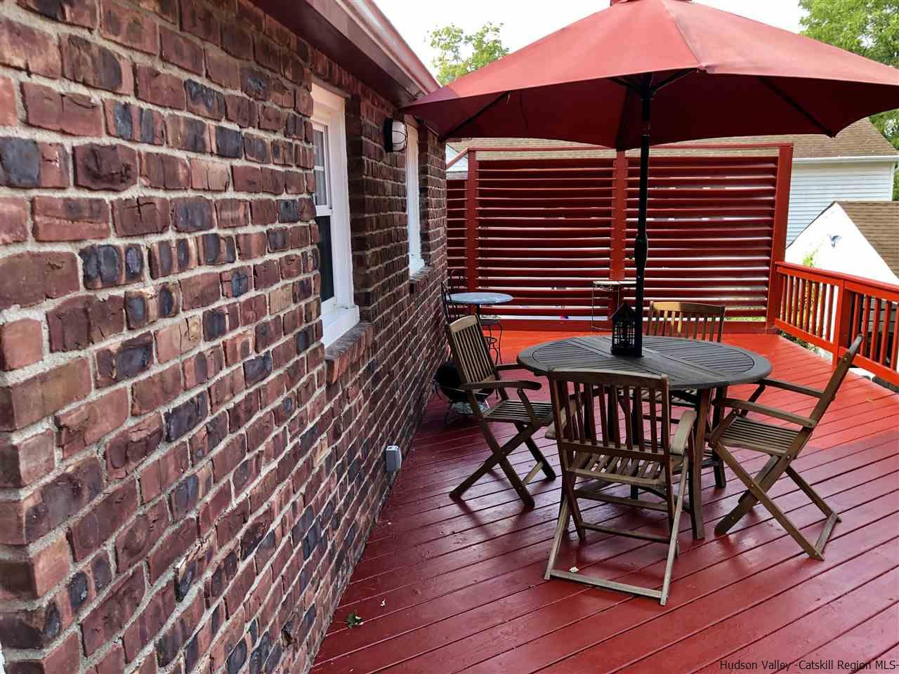 160 Old Rte 209 Hurley, NY 12443 - Photo 7 of 29 a view of balcony with wooden floor and outdoor seating