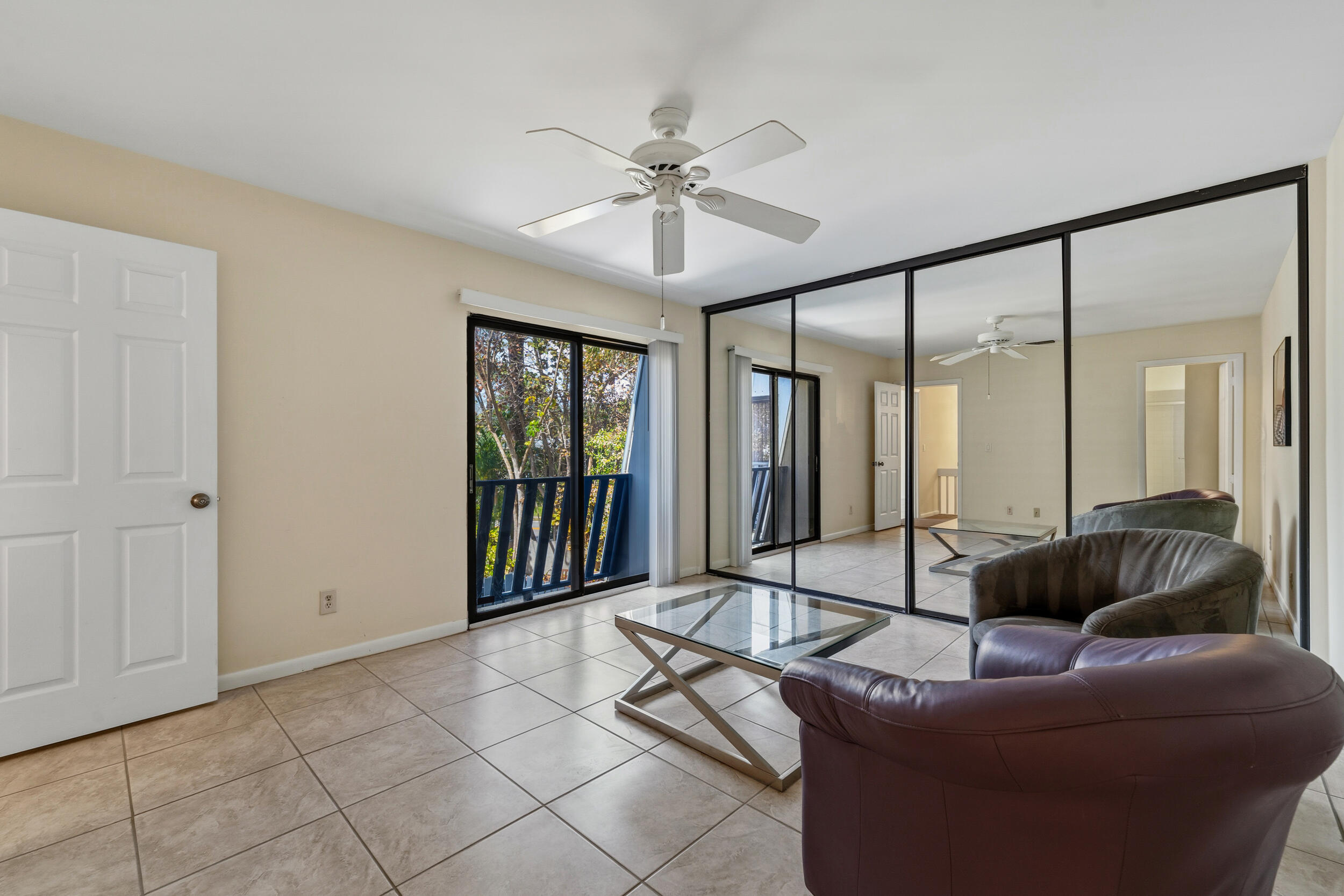 3852 Jefferson Street Stuart, FL 34997 - Photo 26 of 42 a living room with furniture and a large window