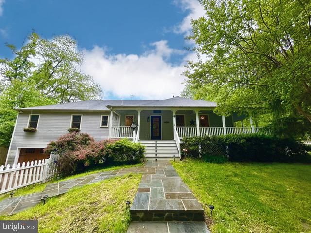 510 Washington Grove Lane Washington Grove, MD 20880 - Photo 1 of 45 a front view of house with yard and green space
