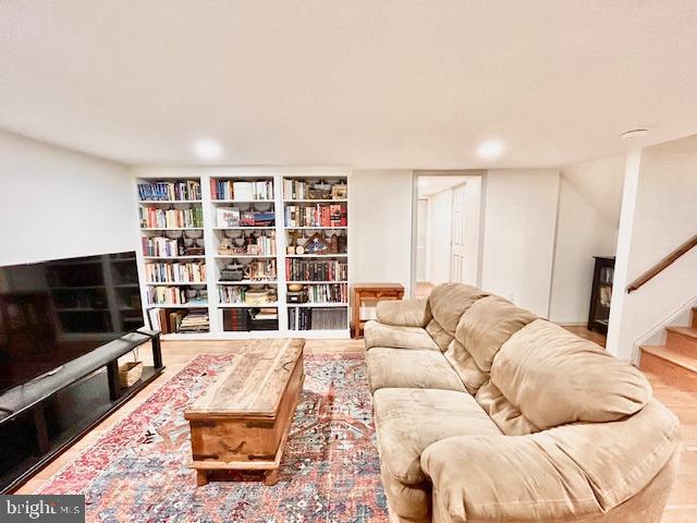 510 Washington Grove Lane Washington Grove, MD 20880 - Photo 27 of 45 a living room with furniture and a flat screen tv