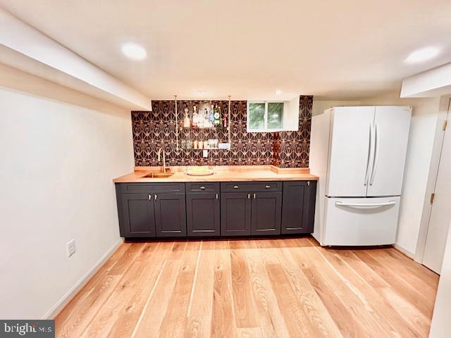 510 Washington Grove Lane Washington Grove, MD 20880 - Photo 33 of 45 a view of a kitchen with a sink and a refrigerator