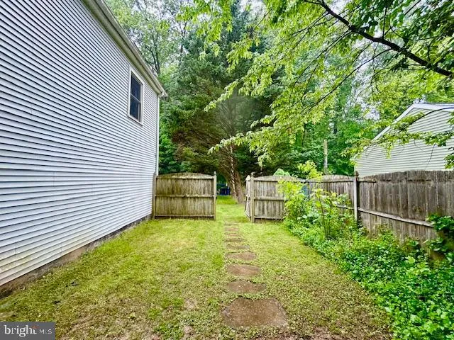 a house view with a backyard space