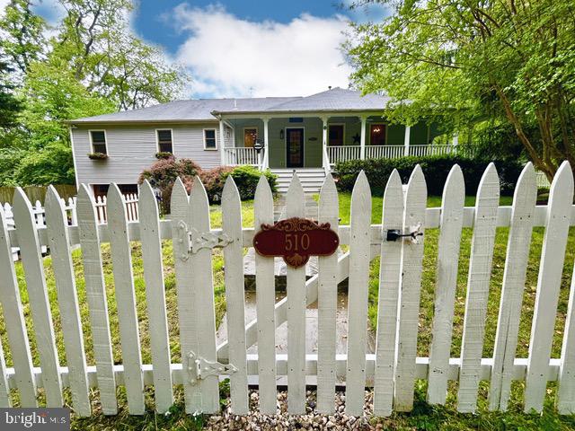 510 Washington Grove Lane Washington Grove, MD 20880 - Photo 45 of 45 a front view of a house with glass windows and plants