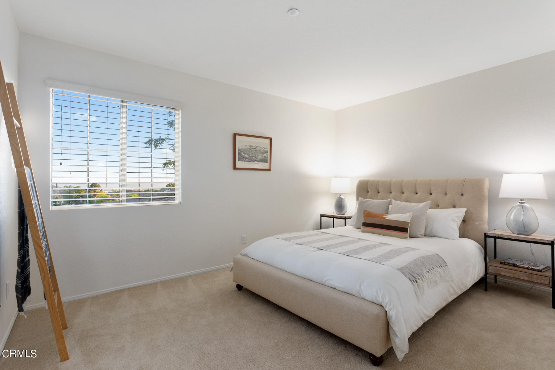 12435 Serrano Way Sylmar, CA 91342 - Photo 15 of 19 a bedroom with a bed and a window